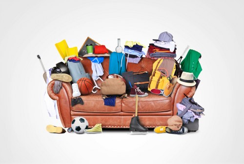 Professionals clearing garden debris in Palmersgreen